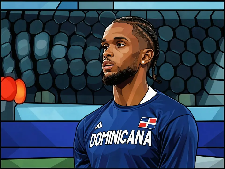 Jean Montero in the Dominican Republic national team blue kit in front of stadium goal