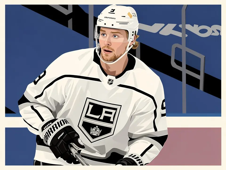 Schwedischer Eishockeyspieler Kempe in weißer Los Angeles Kings Trikot mit Schläger.