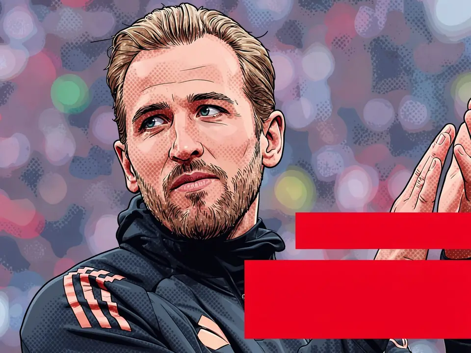 Kane in der schwarzen Trainingsjacke von Bayern München mit orangefarbenen Adidas-Streifen, klatscht vor unscharfen Stadionlichtern