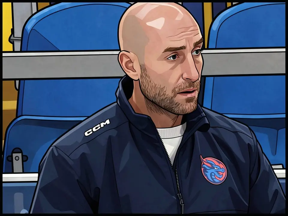 Shanghai-Trainer Mitch Love in blauer Jacke auf der Bank.