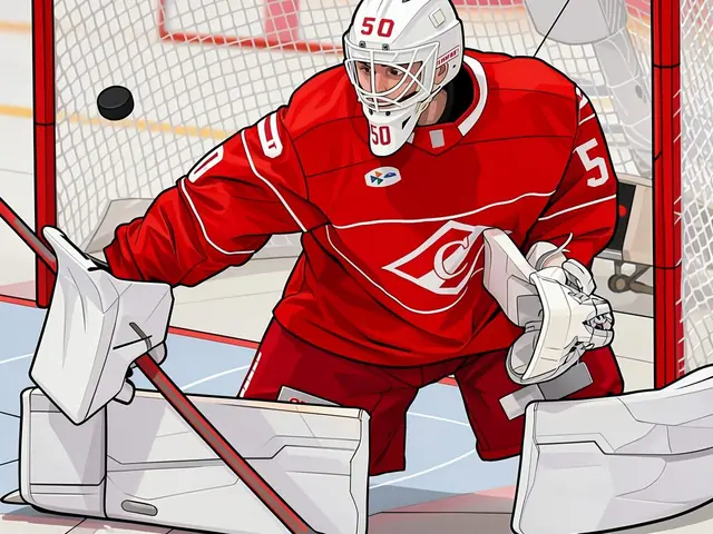 Torwart von Spartak in rotem Trikot in der Hocke vor dem Tor, beobachtet die Puck