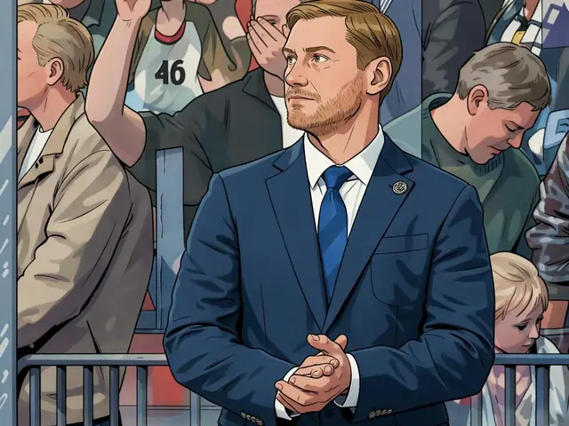 Sibir coach Jaroslav Lusenkov clapping from the bench after the match.
