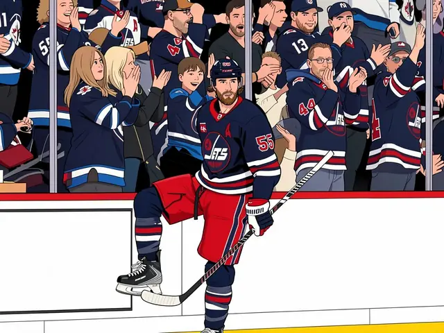 Mark Scheifele der Winnipeg Jets in blauer und roter Trikothülle Nummer 55 steht auf dem Eis vor den Tribünen