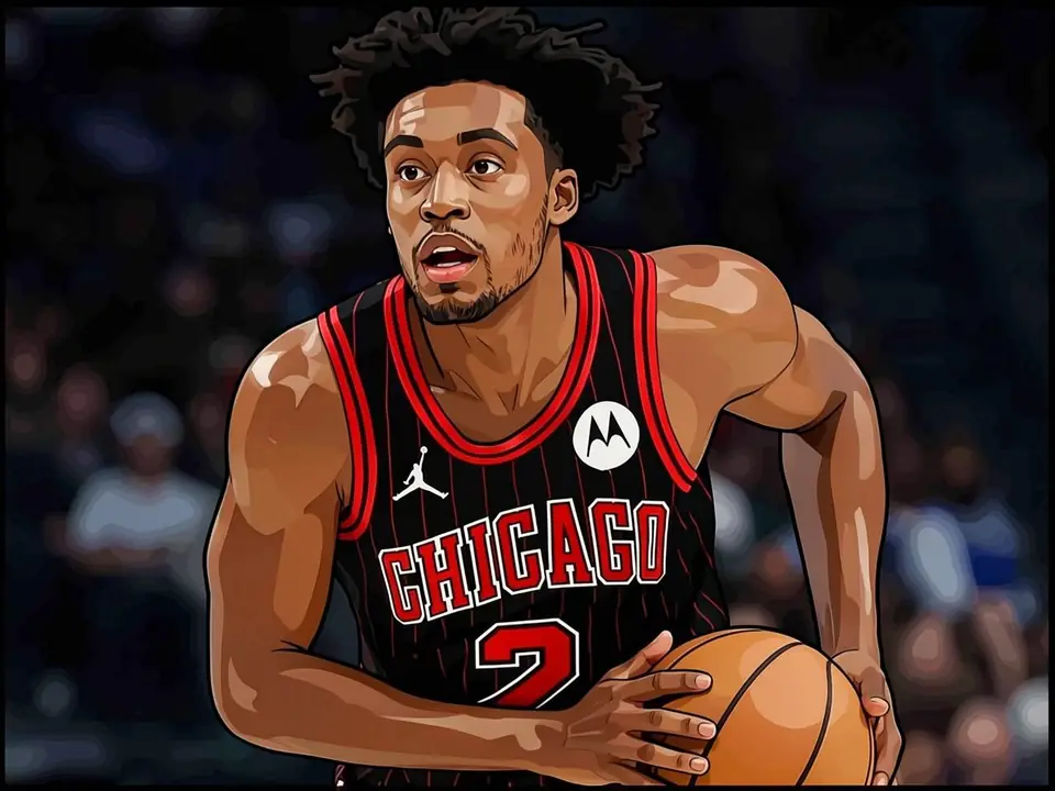 Collin Sexton in a black Chicago jersey with number 2 holds a basketball on the court