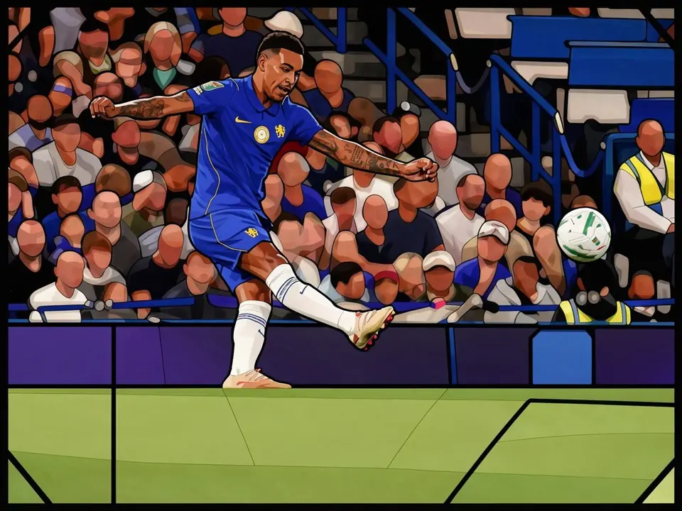 Palmer in Chelsea blue kit strikes the ball on the pitch with spectators behind him