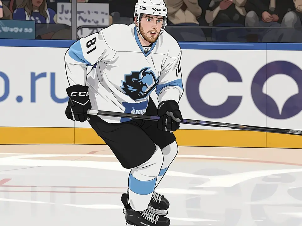 Vitali Pinchuk in a white Metallurg jersey skates with his stick on the ice