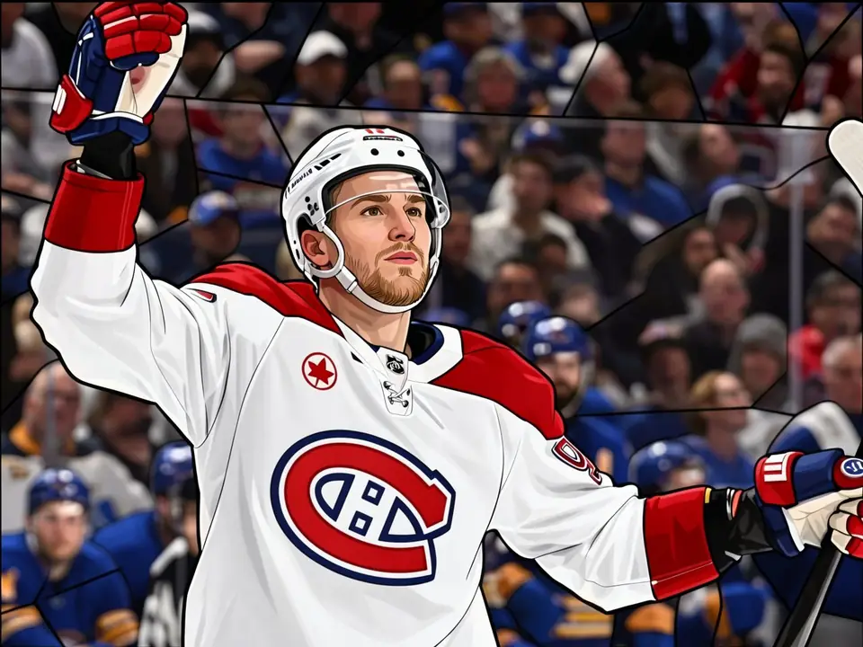 Sergei Samsonow in a white Montreal Canadiens jersey celebrates a goal, raising his right hand while holding a hockey stick.