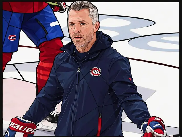 Canadiens coach Martin St. Louis on the ice with a hockey stick during training