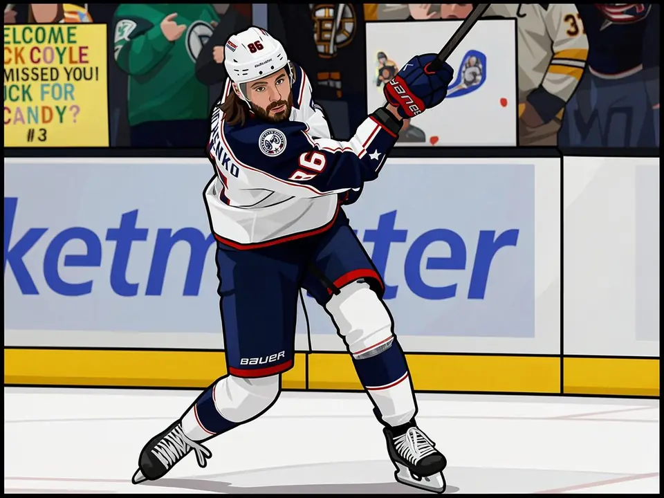 Kirill Marchenko in a Columbus Blue Jackets jersey skating on the ice during a game.