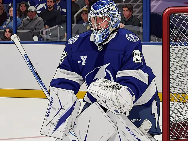 Tampa Bay Lightning goaltender in blue and white kit standing in the goal.