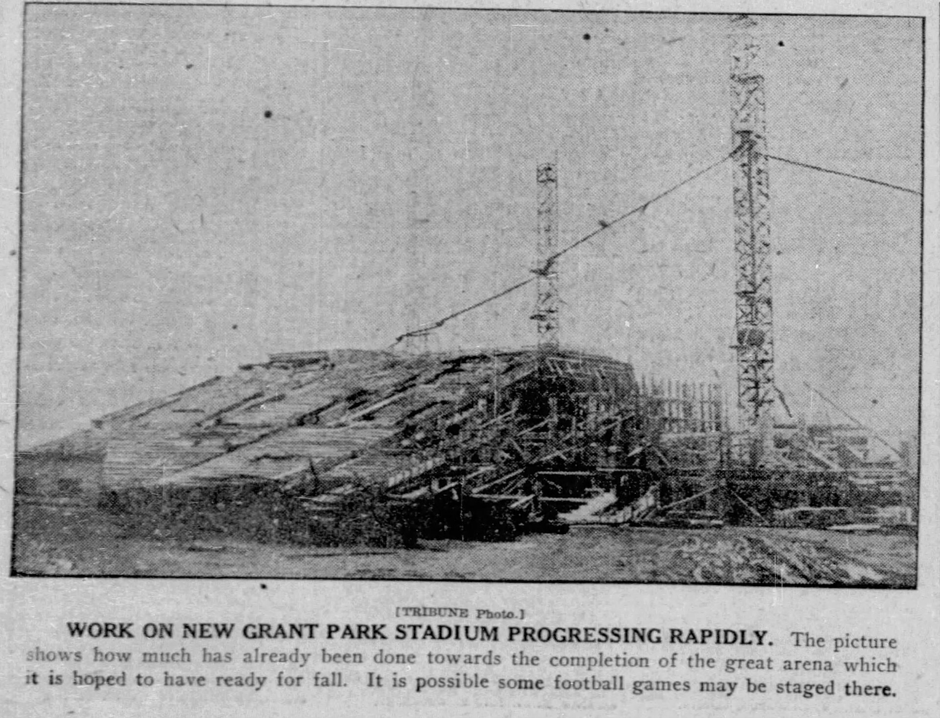 Caption text says "Work On New Grant Park Stadium Progressing Rapidly. This picture shows how much has already been done towards the completion of the great arena which it is hoped to have ready for fall. It is possible some football games may be staged here"