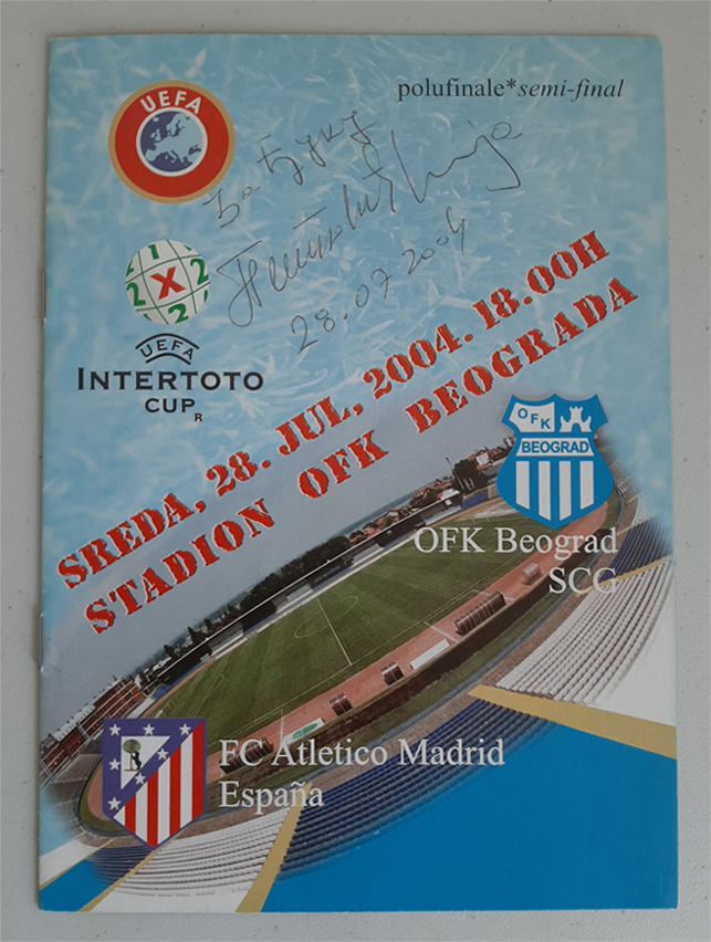 An autograph made out to me from Ilija Petković on the front cover of a match-day program for the semi-final of the 2004 UEFA Intertoto Cup between OFK Beograd and Atlético Madrid.