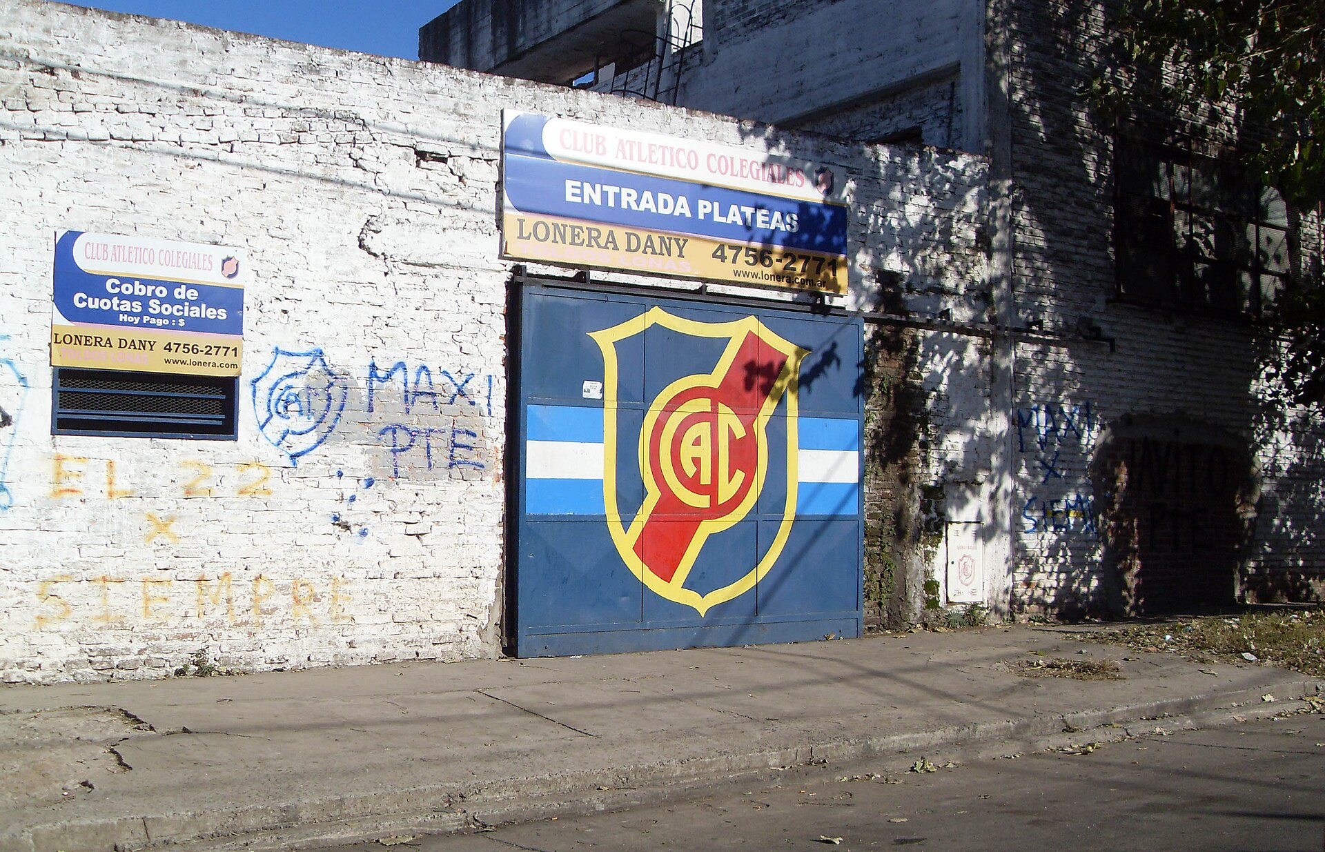 Club A. Colegiales' stadium entrance, on G. Posadas street in Florida, near "Plaza La Paz".