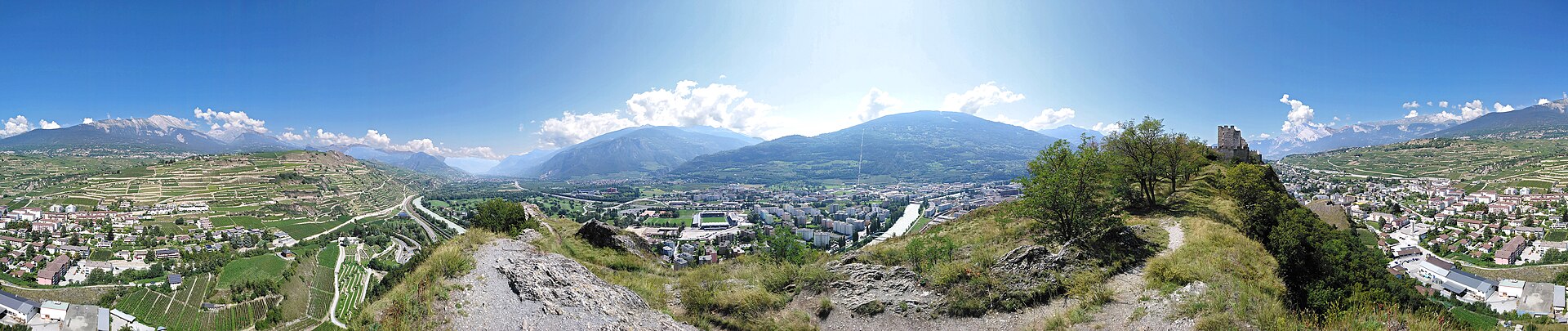 Sion and the Rhône valley. Stadium Tourbillon and castle up of the city in Valais .
