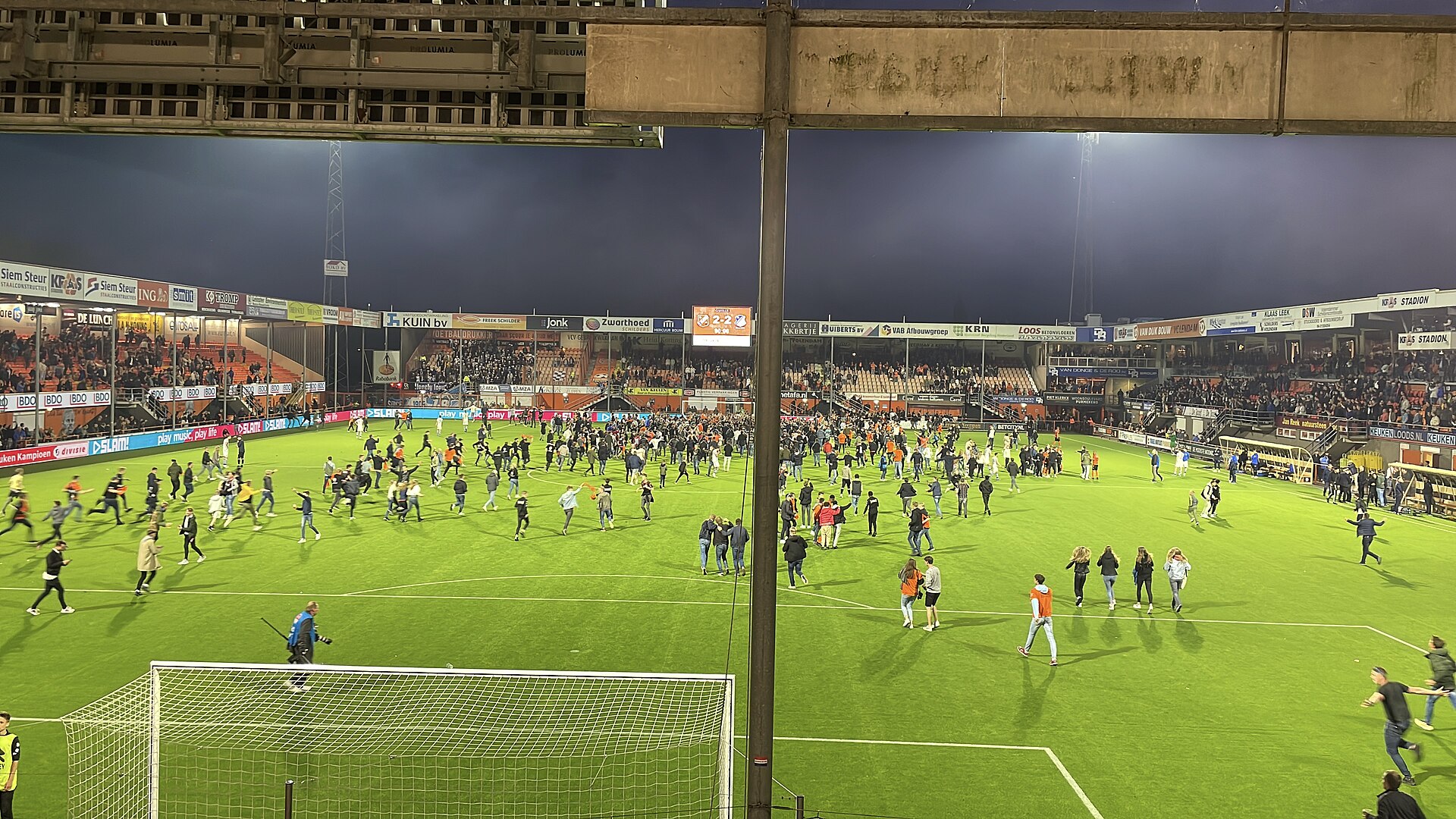 Fans of FC Volendam storm the court to celebrate promoting to the Eredivisie, after a 2–2 match with FC Eindhoven.