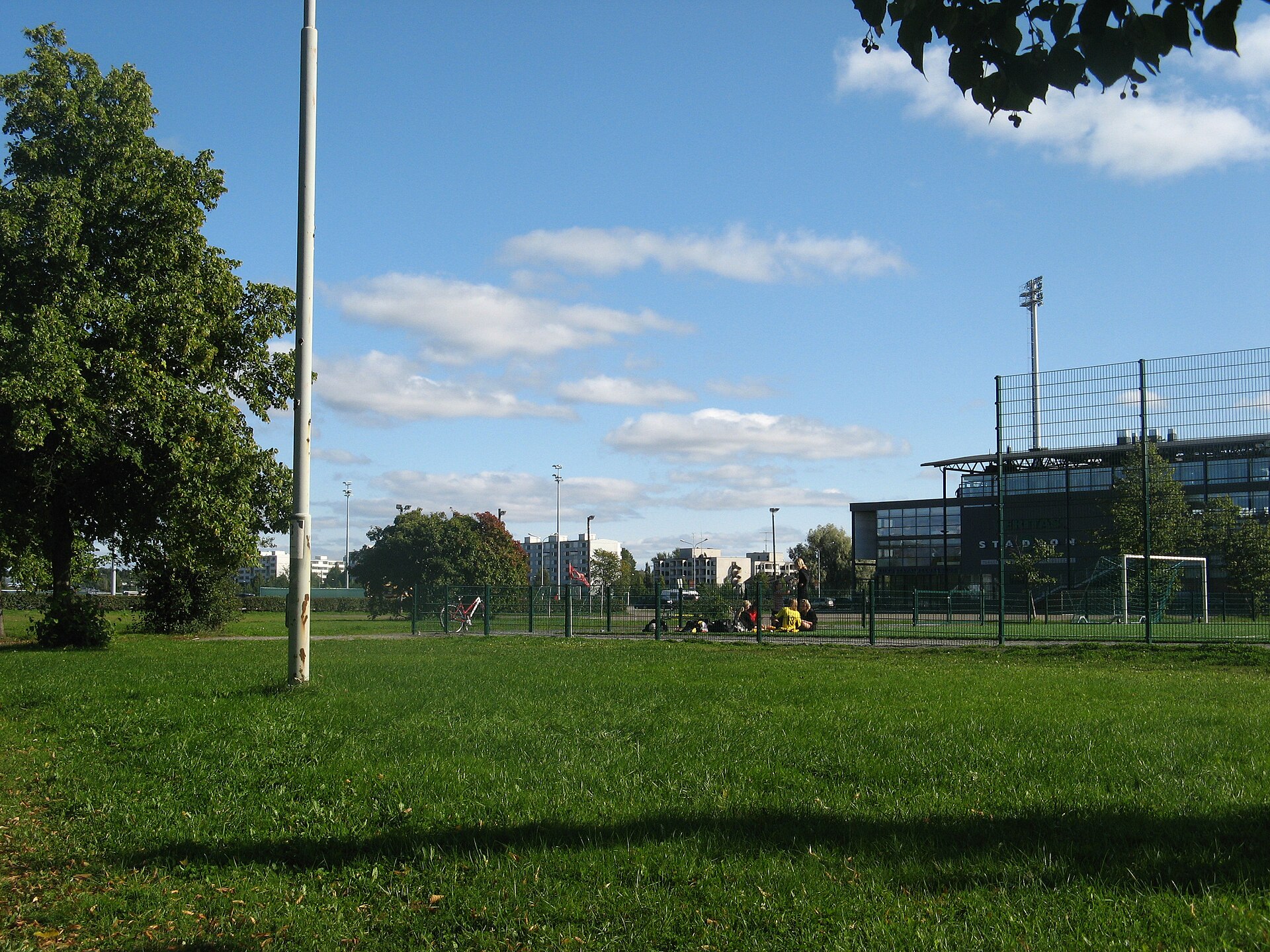 A football court and the football stadium in Kupittaanpuisto park in Turku .