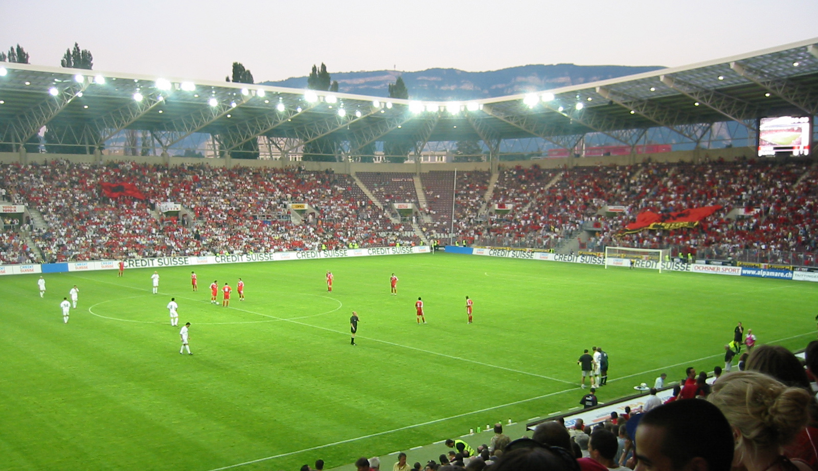 Albanian (white shirts) and Swiss (red) national soccer teams at the kick-off of the qualification game for Euro 2004 in Geneva, Stade de Genève, on June 11, 2003. Switzerland won 3-2.