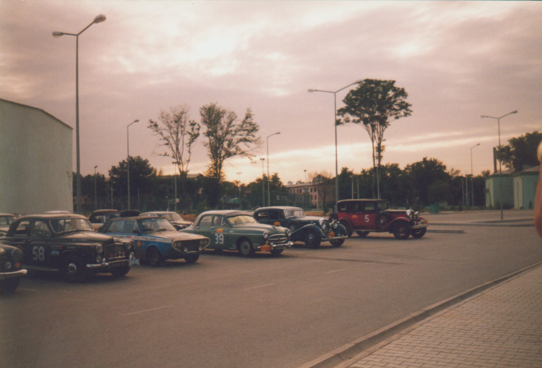 "Around the world in 80 days" motor challenge competitors On "Kopetdag" stadium parking. Ashkhabad, Turkmenistan.