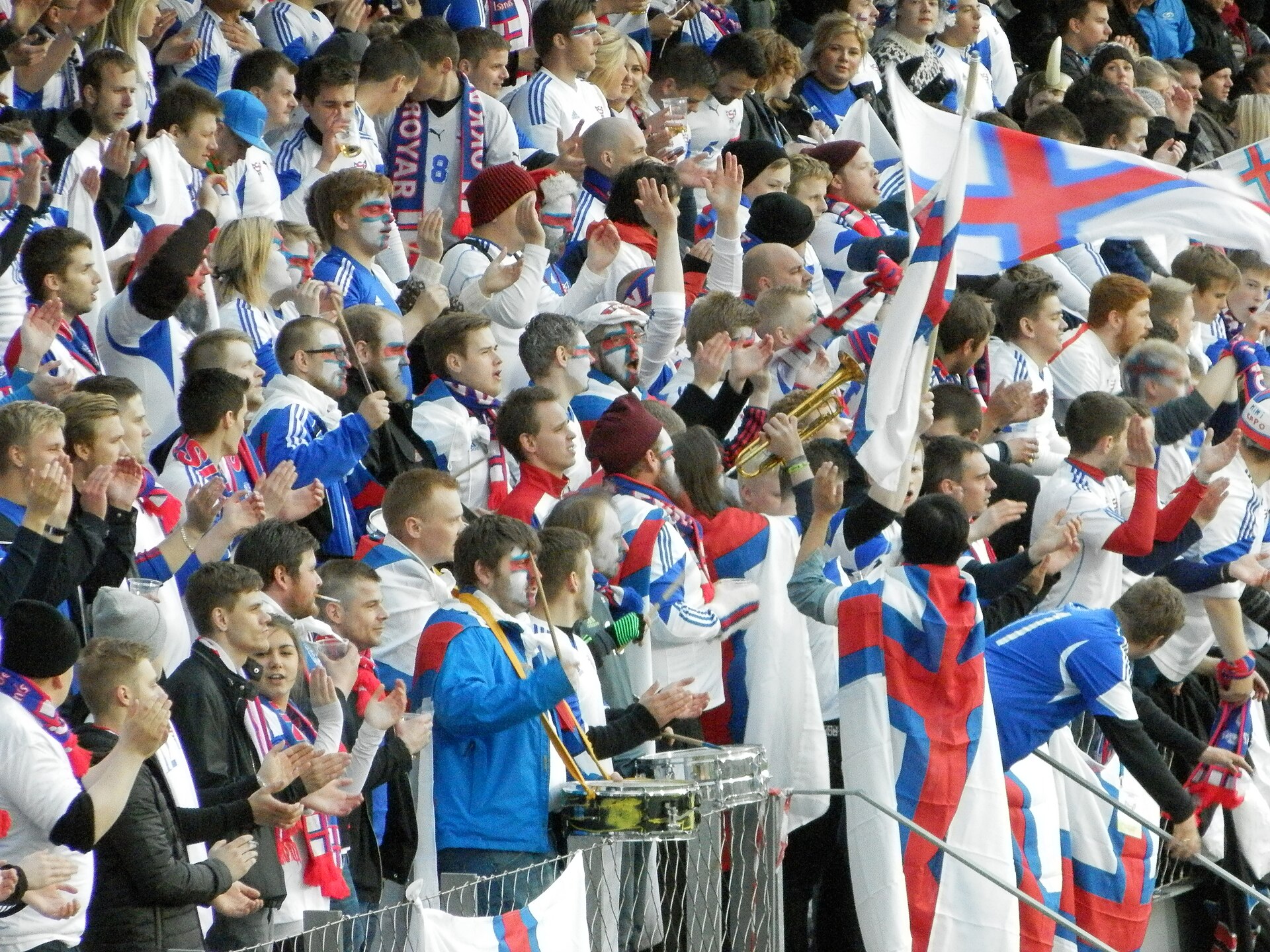 Football match between the national teams of the Faroe Islands and Northern Ireland on Tórsvøllur in Tórshavn, 4 September 2015. The result was 1-3. On this photo are the supporters of the Faroe Islansd national team, they call themselves Skansin.