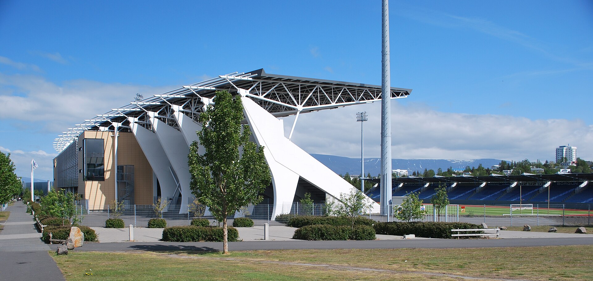 National football stadium Laugardalsvöllur, Reykjavik, seen from the footpath along Reykjavegur