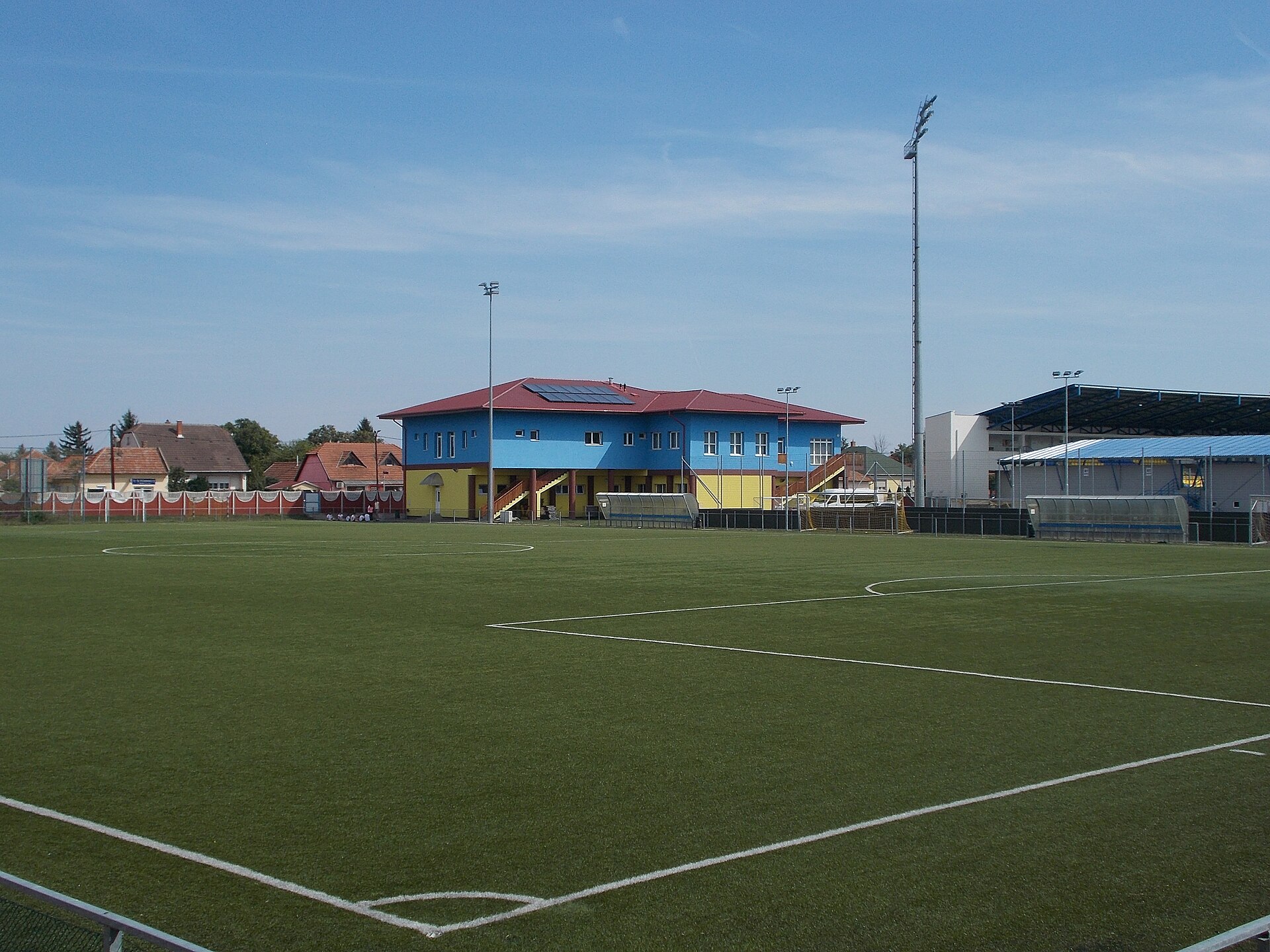 : Sport facility, in front a grassy city stadium. Viewed from Kavicsos-tó street. - Entry from Széchenyi István street, Mezőkövesd , Borsod-Abaúj-Zemplén County , Hungary .