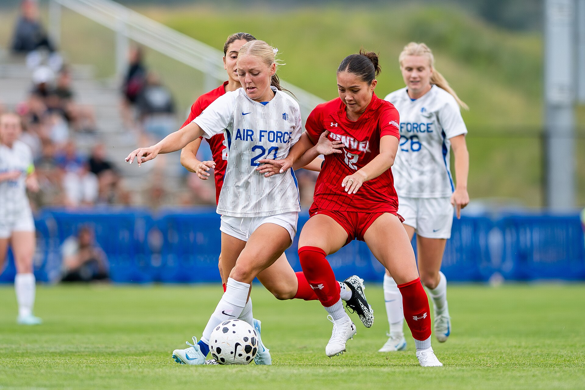 U.S. AIR FORCE ACADEMY, Colo. -- Air Force’s Eleanor Musgrove fights Denver's Luci Vincent for the ball during a home game against University of Denver at the Academy’s Cadet Soccer Stadium in Colorado Springs, Colo., August 14, 2025. Air Force eventually lost to Denver 1-2. (U.S. Air Force photo by