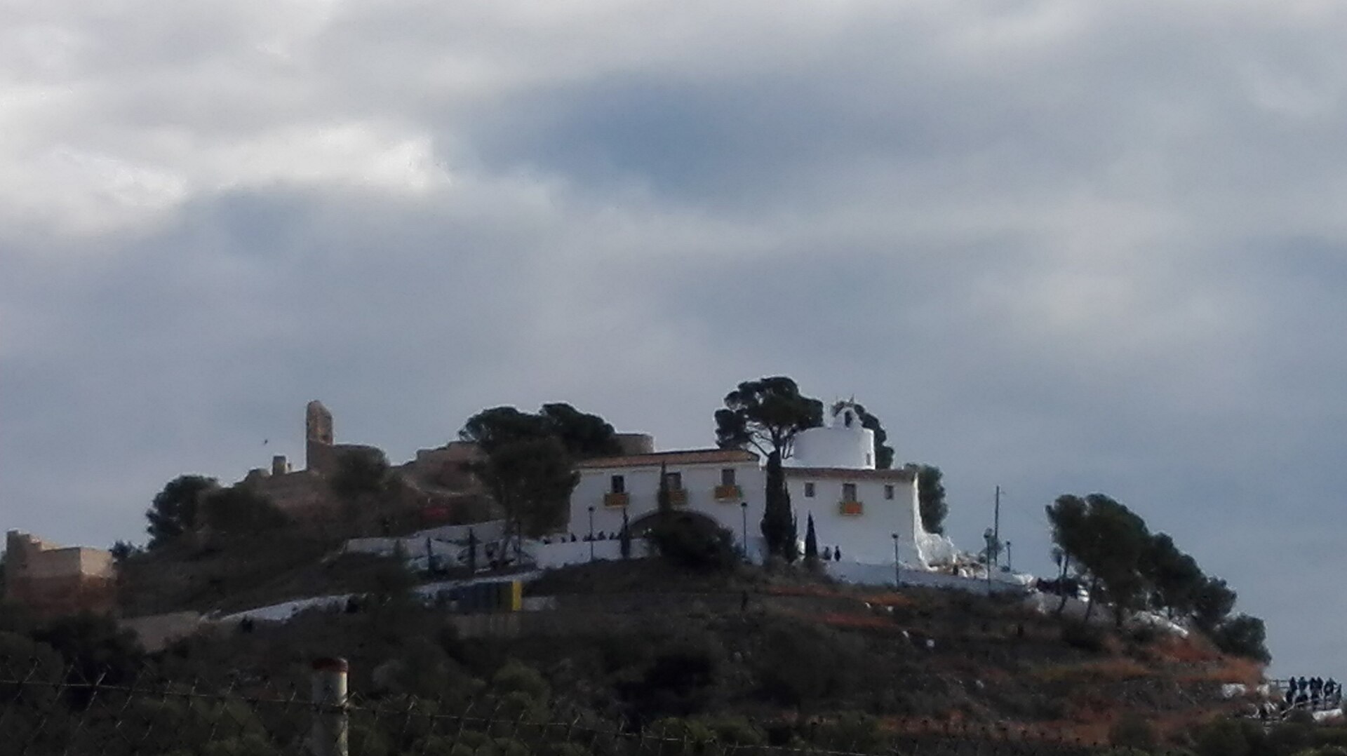 View of the Saint Mary Magdalene hermitage and the Castell Vell castle during the "Romería de les Canyes" pilmgrinage in the Magdalena festival on sunday 28 of February, 2016 in Castelló de la Plana, Spain.