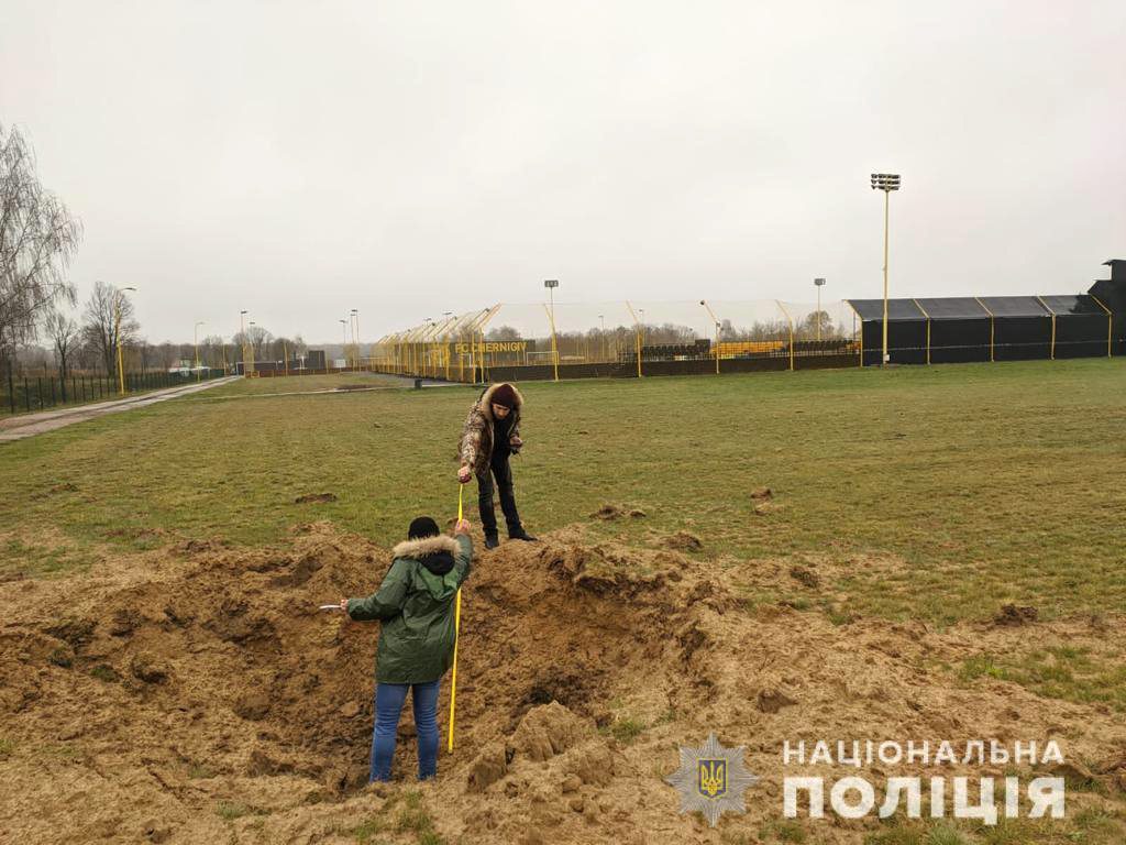 Outskirts of the stadium Chernihiv Arena (in the background) after Russian shelling in March 2022.