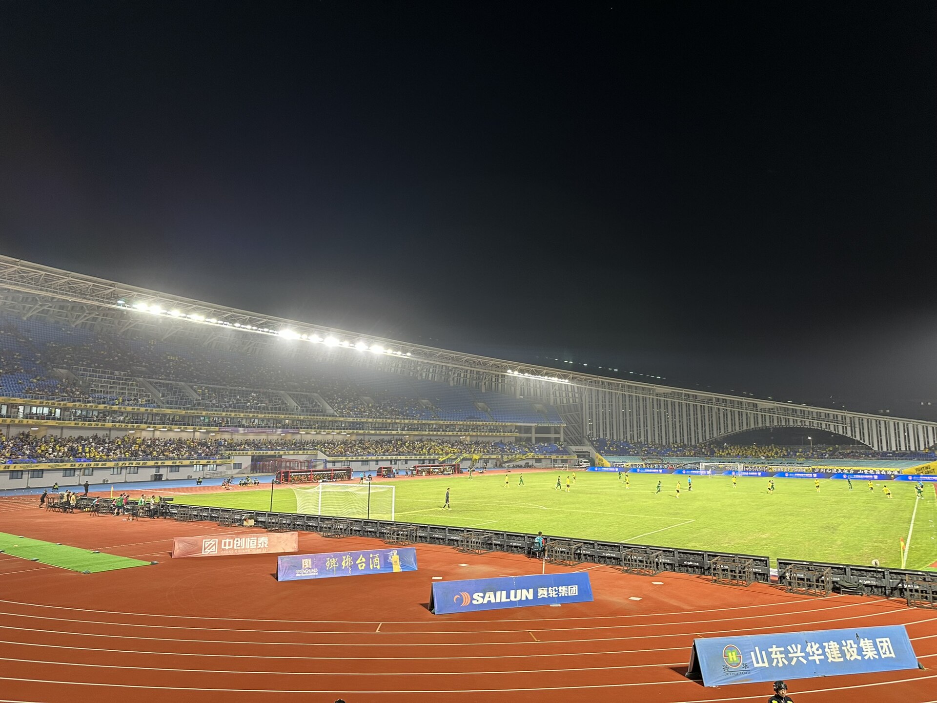 A Chinese Super League game between Qingdao West Coast and Beijing Guoan taking place on 11 August 2024.