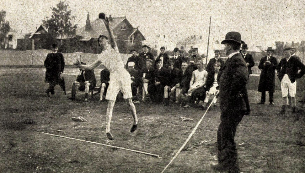 Oscar Guttormsen at Frogner stadium in Oslo, putting a shot? This is at a two-day competition held 1–2 September 1906. Mostly Norwegians, but also 5 from Denmark, as well as the dane Haakon VII who did not compete. Oscar Guttormsen won the Kongepokal as well, even if he did not win, since the winner