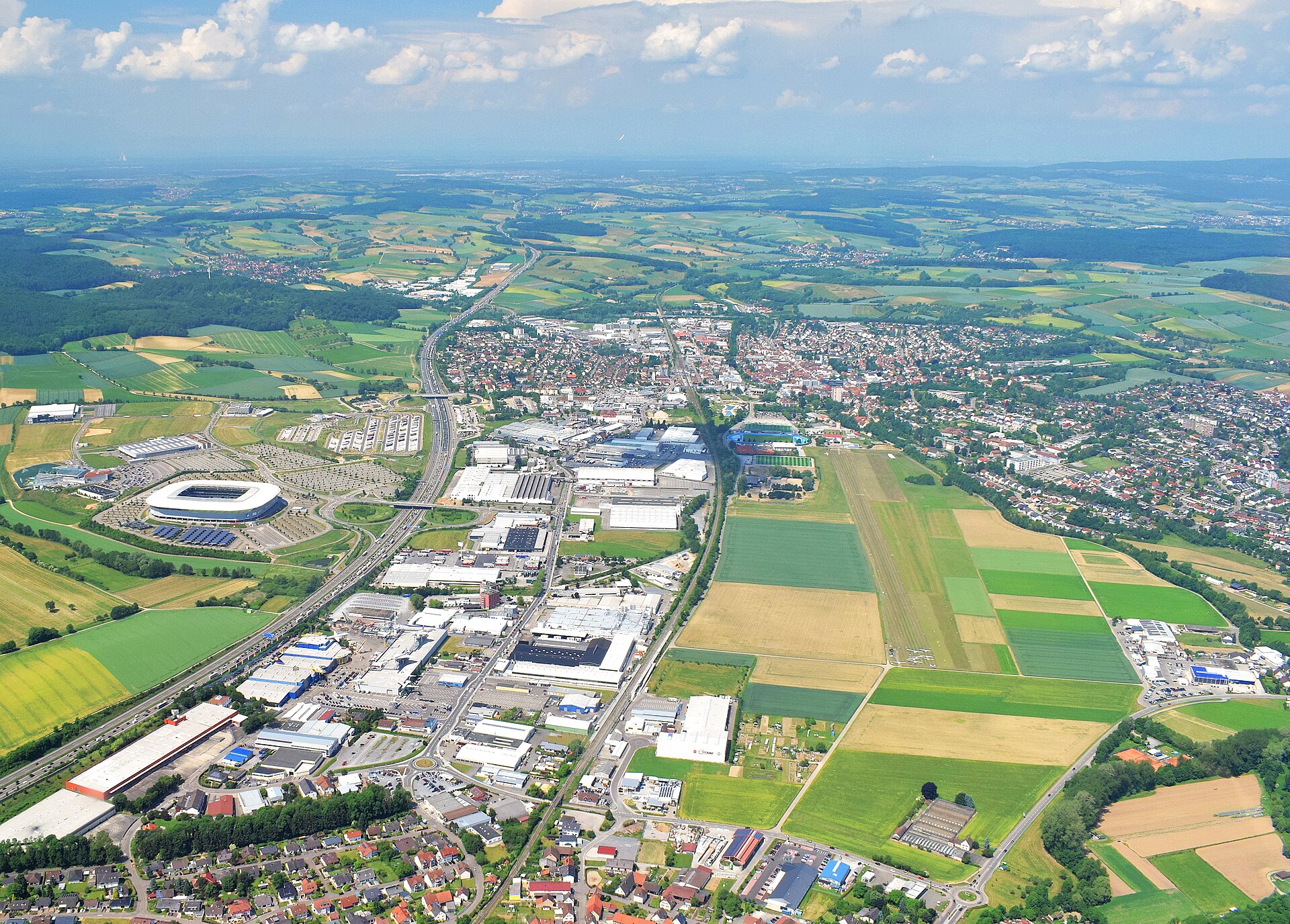 Sinsheim, aerial view from east to west, with stadium, technology museum and airfield