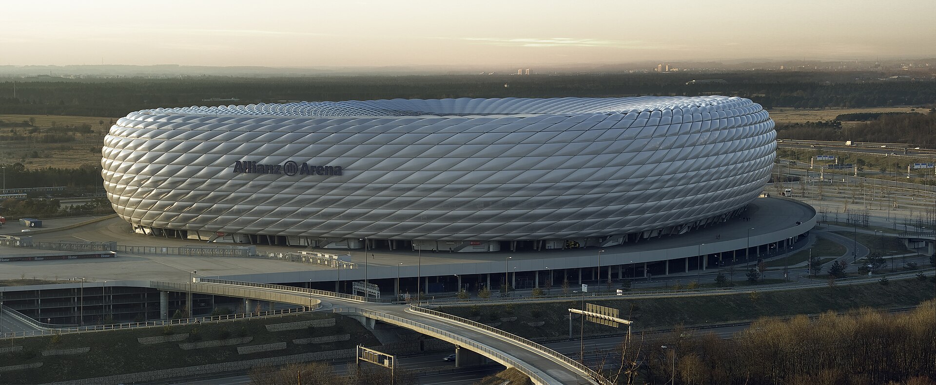 The Allianz Arena is a football stadium in the north of Munich, Germany. The two professional Munich football clubs FC Bayern München and TSV 1860 München have played their home games at Allianz Arena since the start of the 2005/06 season. Because of its shape, the stadium is nicknamed the « Schlauc