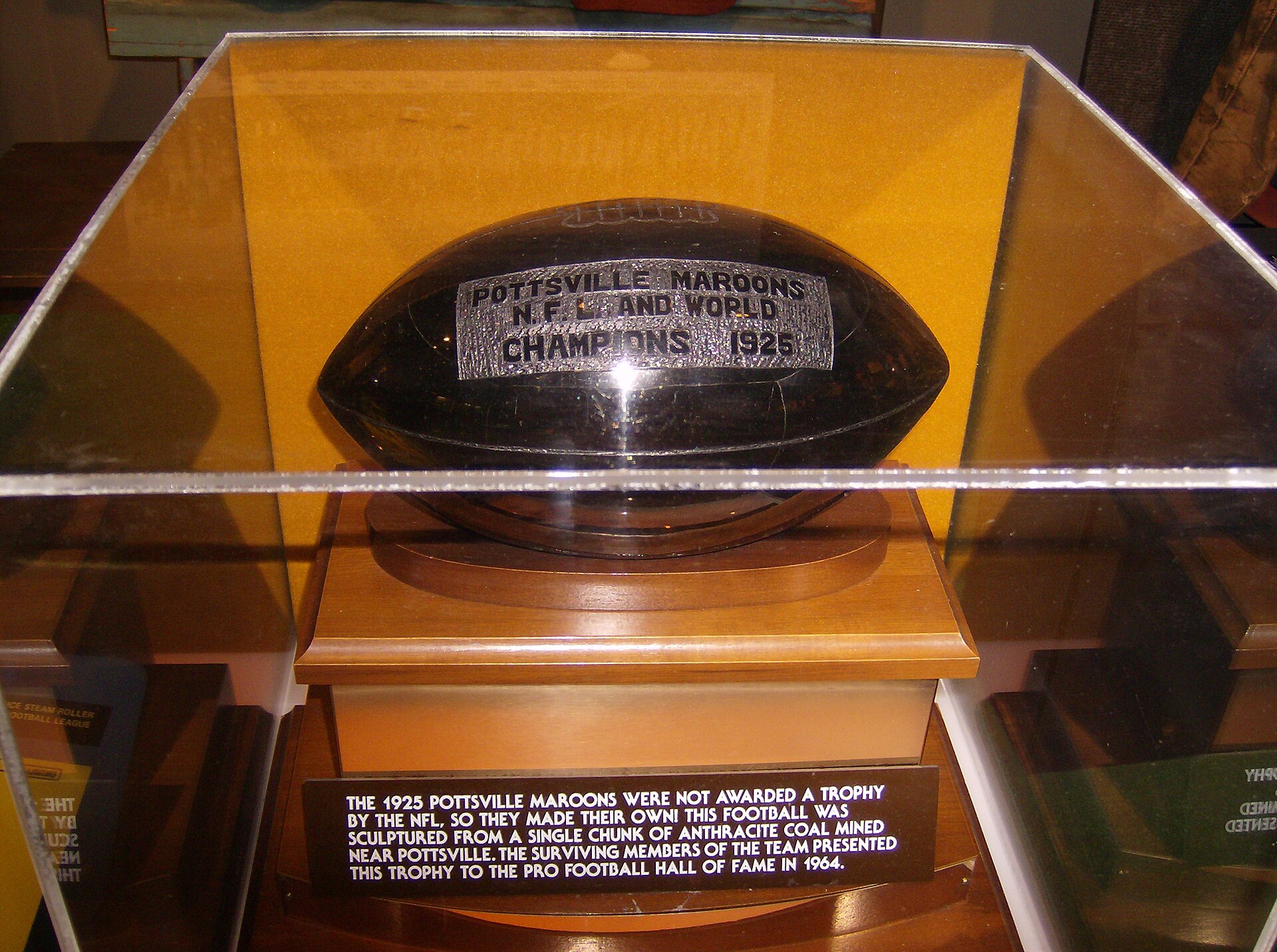 The Pottsville Maroons' self-made 1925 NFL Championship trophy (carved out of anthracite coal) on display at the Pro Football Hall of Fame in 2006.