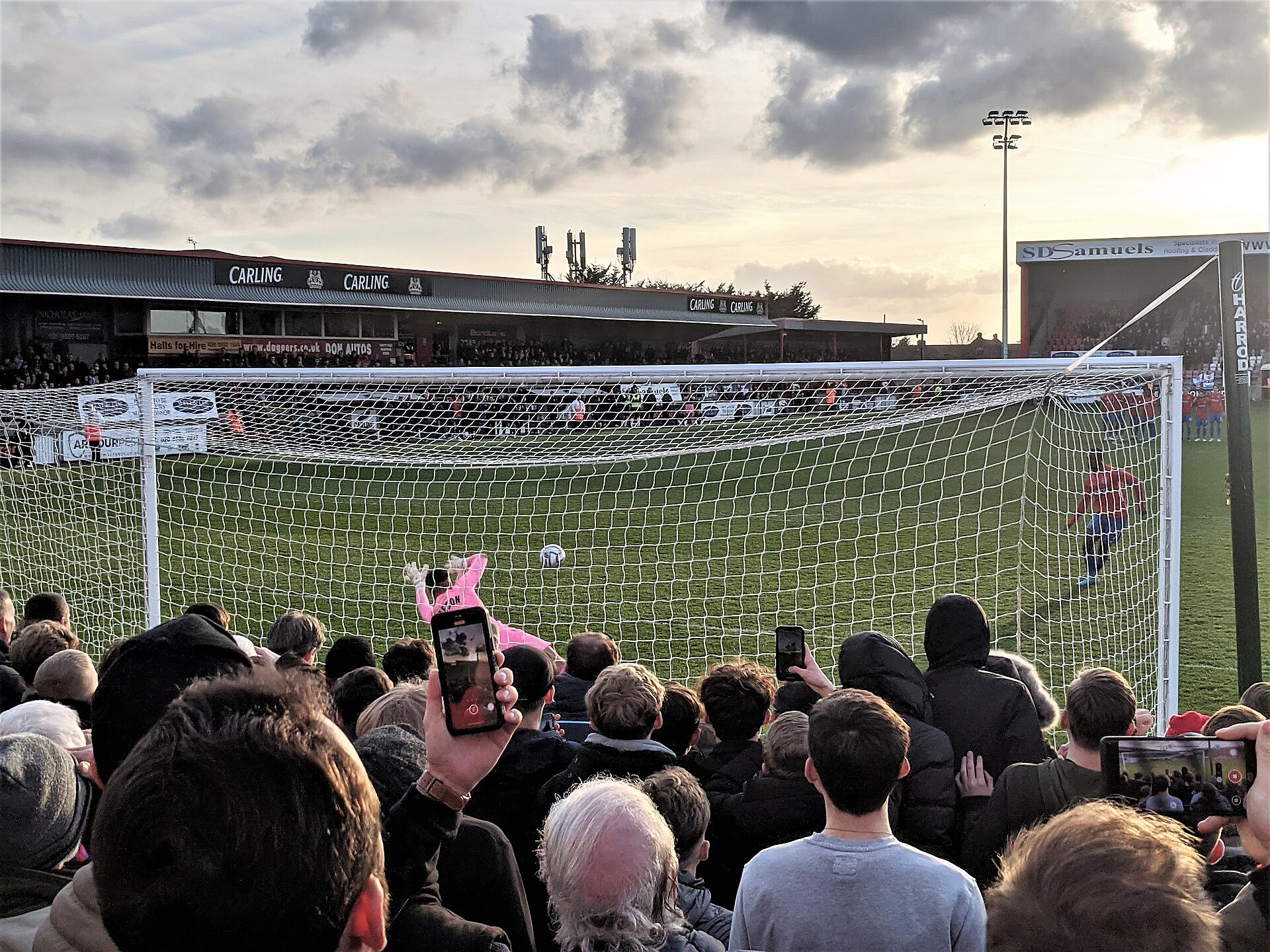 York City goalkeeper Peter Jameson saves a penalty against Dagenham & Redbridge in the FA Trophy quarter-final match at Victoria Road, London on 12 March 2022.