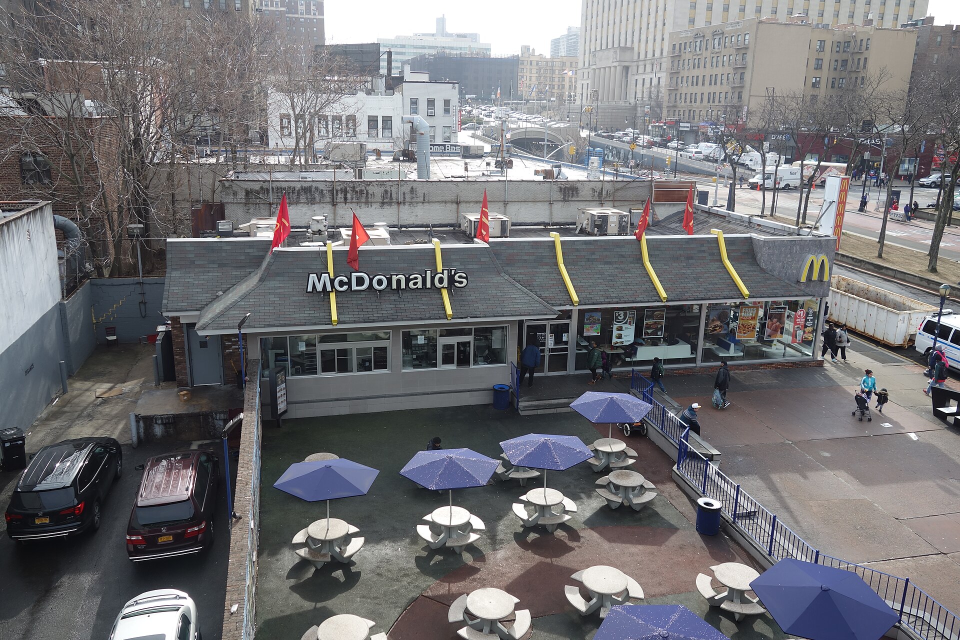 Looking down at the McDonald's restaurant located across from Yankee Stadium, looking from the Bronx-bound platform of the 161st Street – Yankee Stadium IRT station, above River Avenue and 161st Street in Highbridge / Concourse, Bronx.