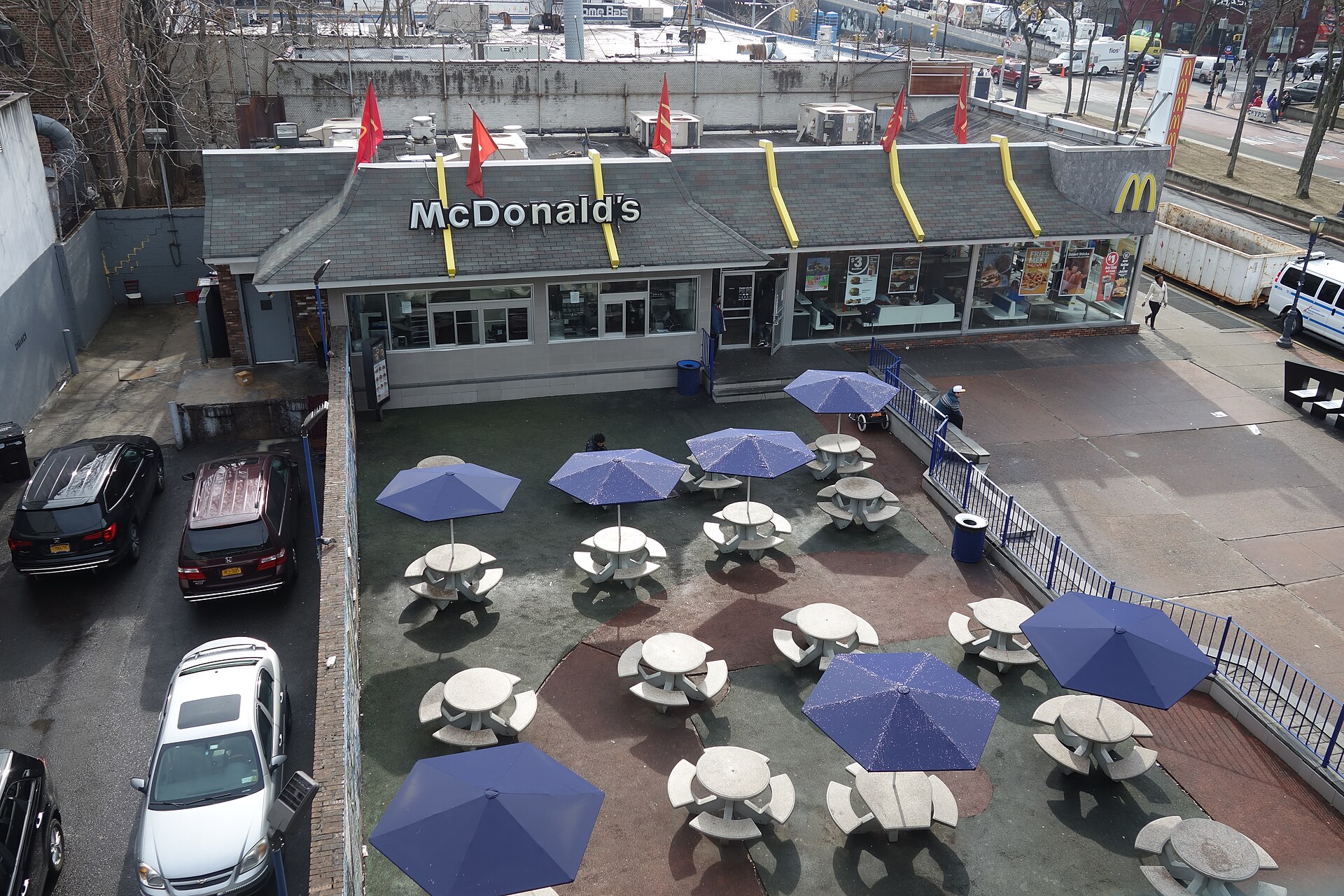 Looking down at the McDonald's restaurant located across from Yankee Stadium, looking from the Bronx-bound platform of the 161st Street – Yankee Stadium IRT station, above River Avenue and 161st Street in Highbridge / Concourse, Bronx.