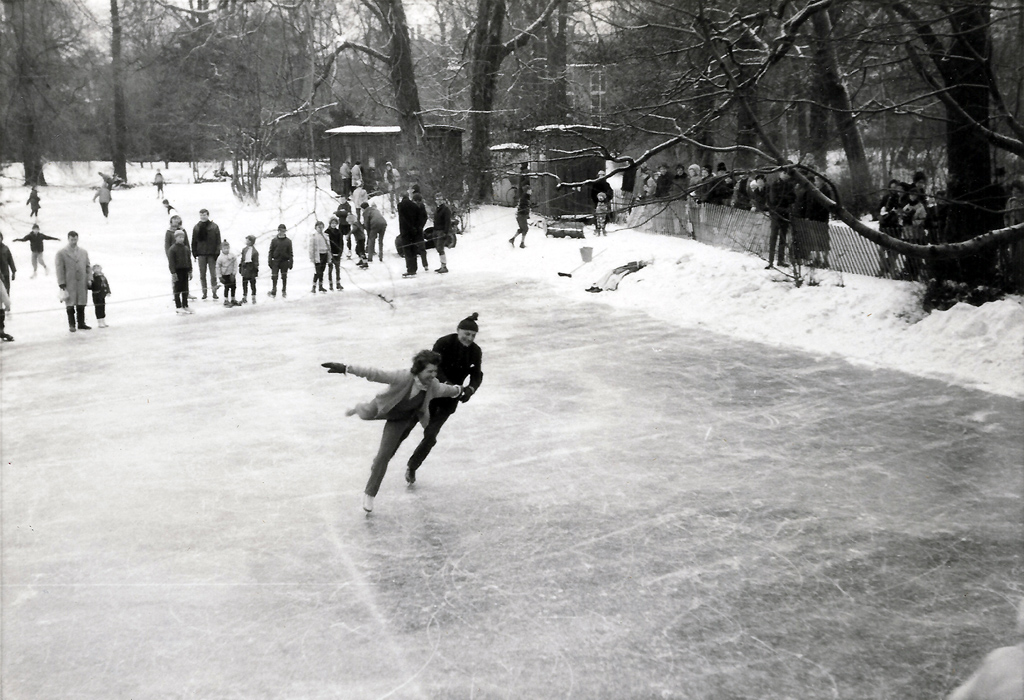 The Danish figure skating champions for pair, Eva & Harry Meistrup, show their skills on a frozen channel in Frederiksberg Castle's Garden, Copenhagen ca. 1958.