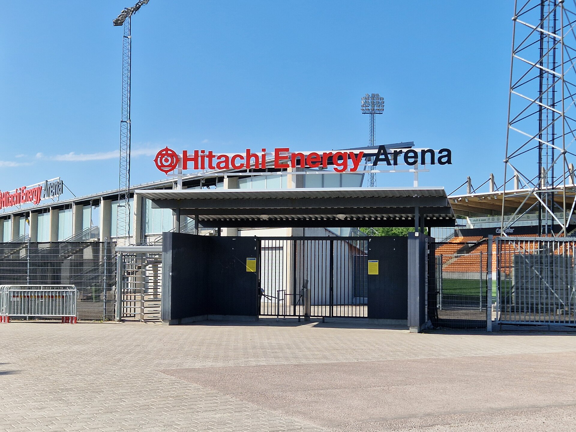 Hitachi Energy Arena (for football), located on the Rocklunda sports area in Västerås, Sweden. The northern entrance. It can hold an audience of 7 000 of which 4 126 can be seated. It has heated artificial turf. It started 2008, recently renamed to Hitachi Energy Arena in 2023.