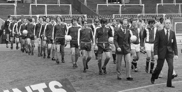 Altrincham FC v Leatherhead FC 1978 at Wembley Stadium. From front to back the line-up is Tony Sanders (manager), John King (captain), Stan Allan, Peter Eales, John Owens, Jeff Johnson, John Davison, Graham Heathcote, Ian Morris, Ivan Crossley, Malcolm Bailey, Joe Flaherty and John Rogers.