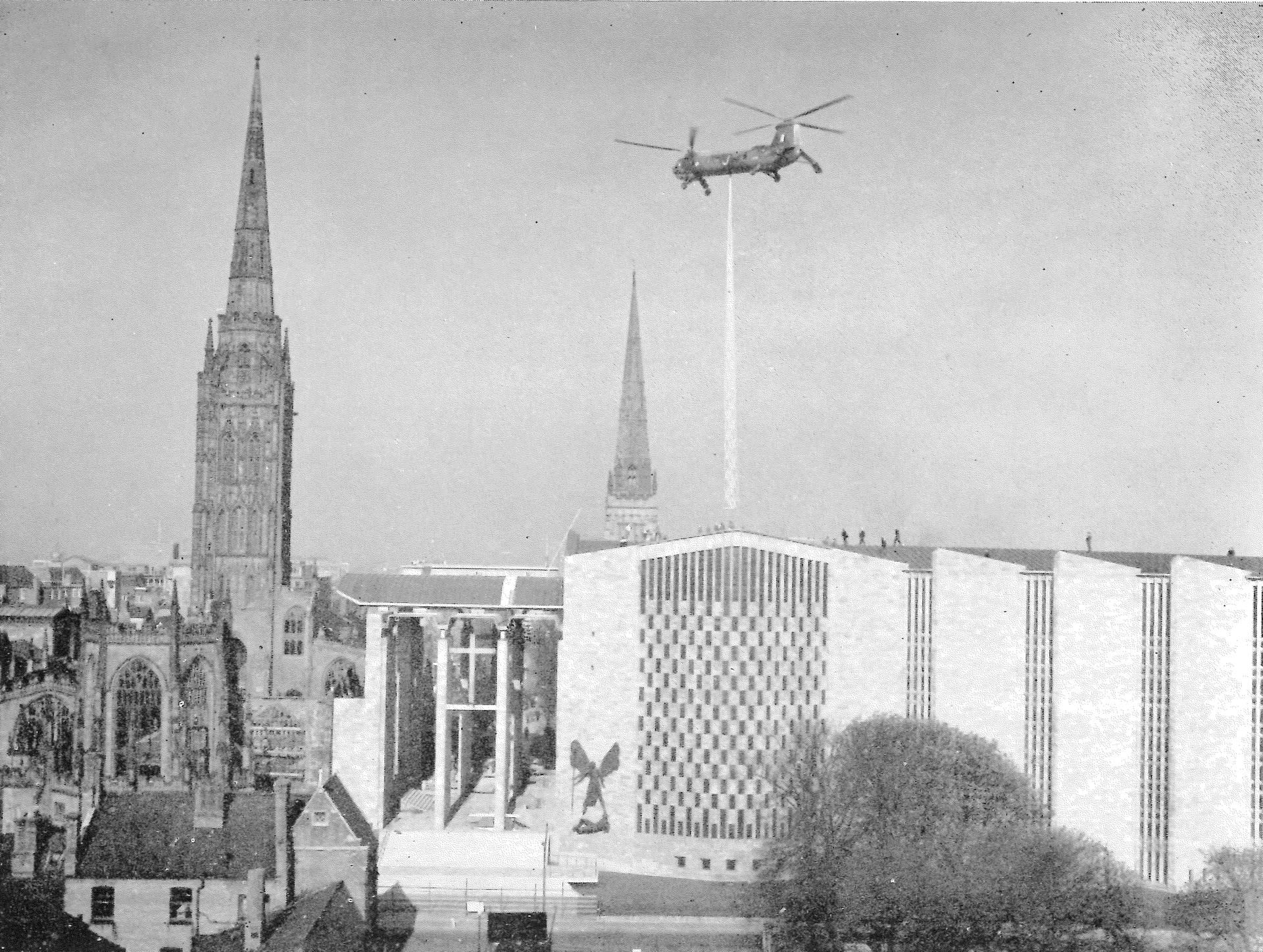 A Royal Air Force helicopter of No. 38 Group placing the flèche on the new Cathedral church of St. Michael, Coventry, April, 1962. (text from original Christmas card).