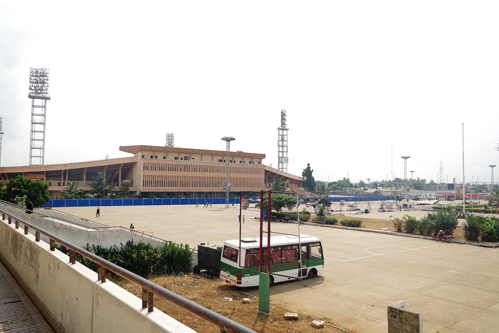 Front of the sports hall of the General Mathieu KéréKou stadium in Cotonou, Benin. view taken from the stairs at the entrance to the sports hall.Built in November 1982, it is being rehabilitated