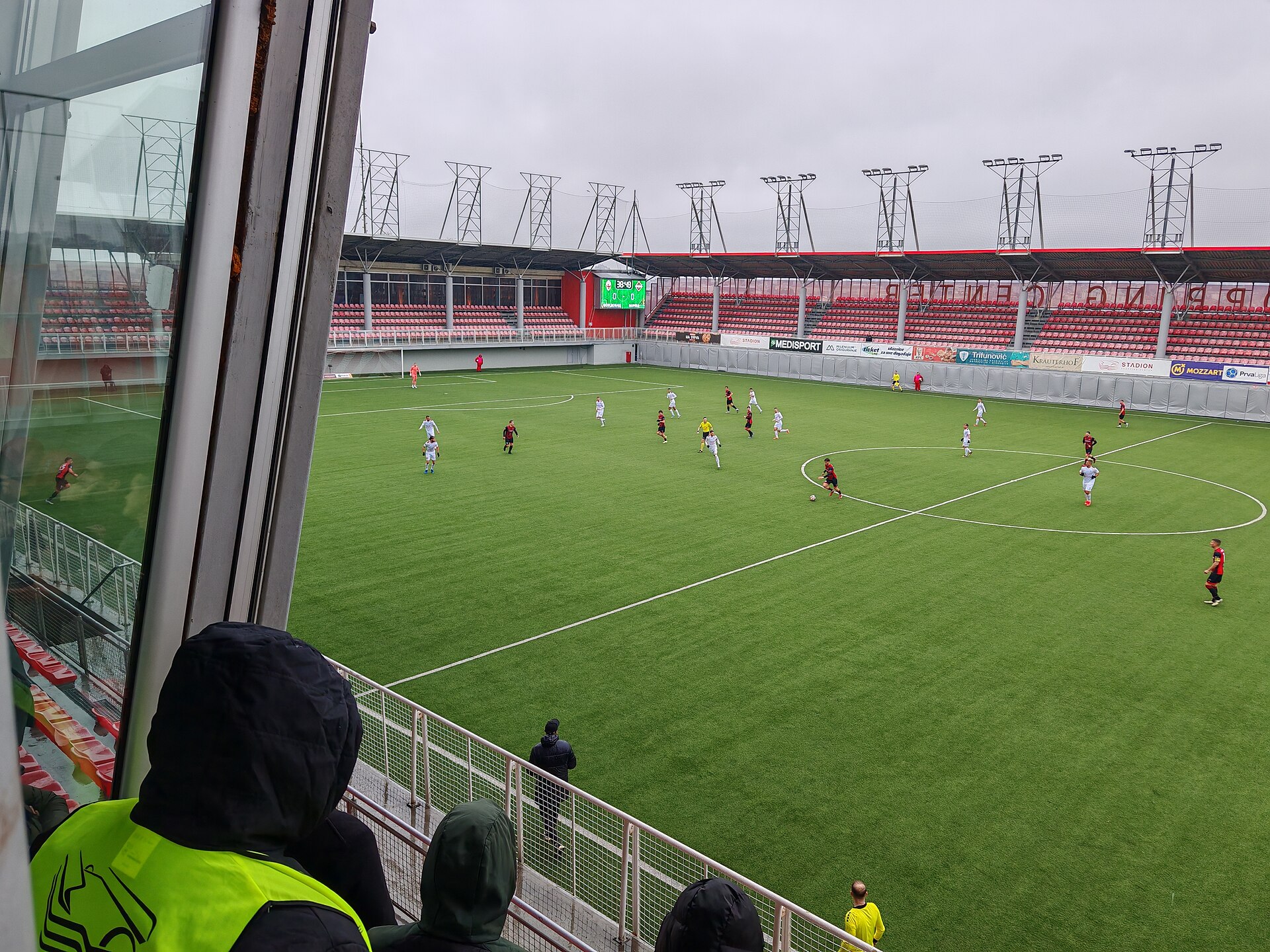 View on football pitch of Voždovac Stadium from the west stand, February 2026