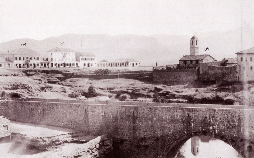 Podgorica, Montenegro. View of Ribnica River, Catholic Church (right), Debbaglar Bridge, government mansion (konak) and the Mirko Varosh Hotel (far left), before 1901. Sultan Abdul Hamid Photo Collection, Istanbul University Library, No. 91243-99