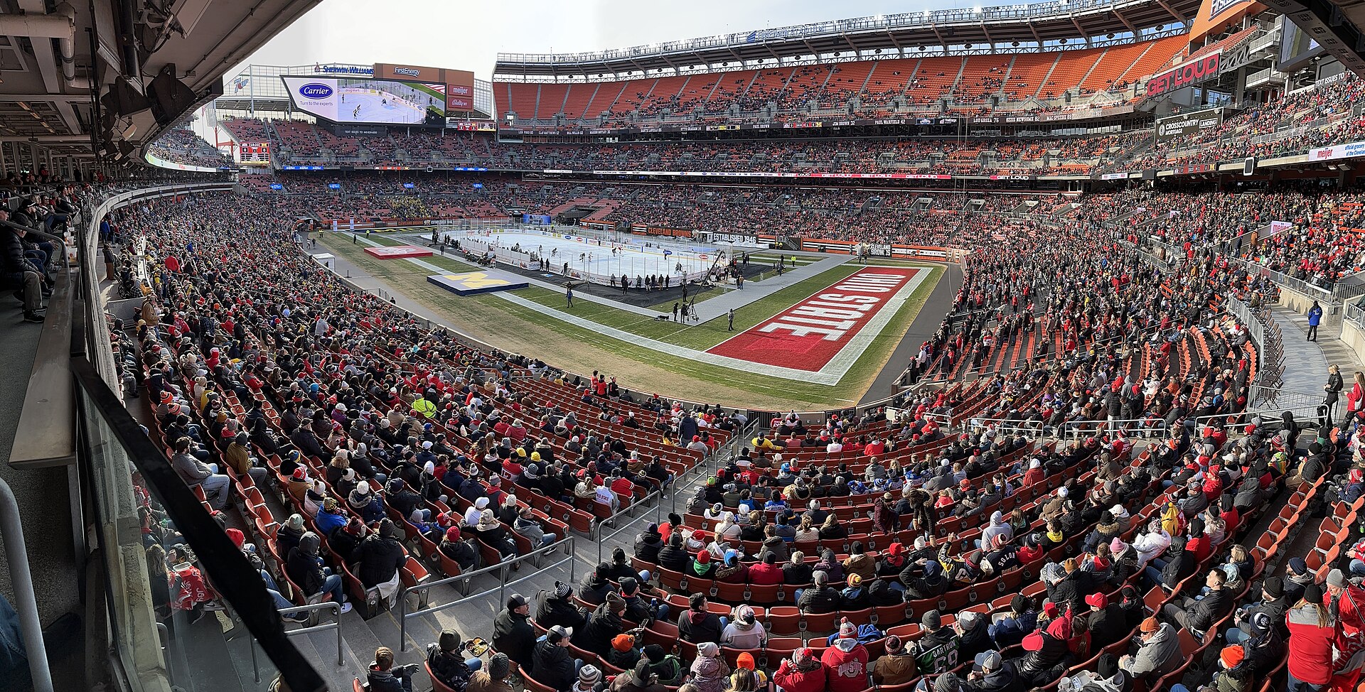 Interior view of the setup and crowd during the 2023 Faceoff on the Lake , played February 18, 2023, at FirstEnergy Stadium in Cleveland, Ohio. The Ohio State Buckeyes men's ice hockey team defeated the Michigan Wolverines 4–2 in front of 45,523 fans.