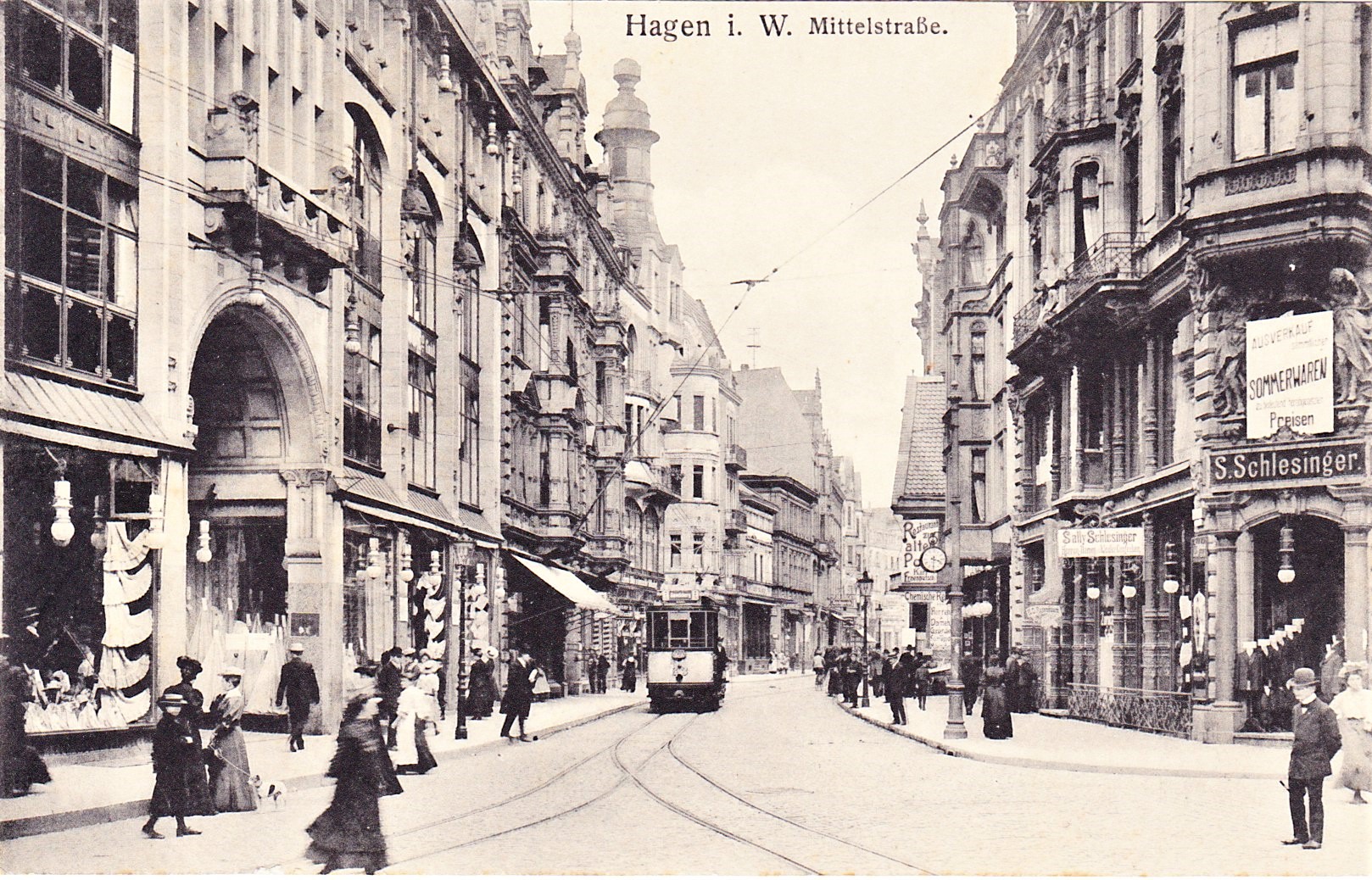 Hagen i. W. Mittelstraße. Postkarte um 1912. Links das Textilkaufhaus Sinn, rechts die Einmündung Marienstraße. Das Abbiegegleis der Straßenbahn nach rechts führt in die Elberfelder Straße.