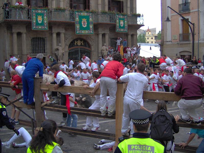 Bulls running on 7th July 2005, Consistorial Square, Pamplona. Image taken by Johnbojaen and uploaded on 1st september 2005.