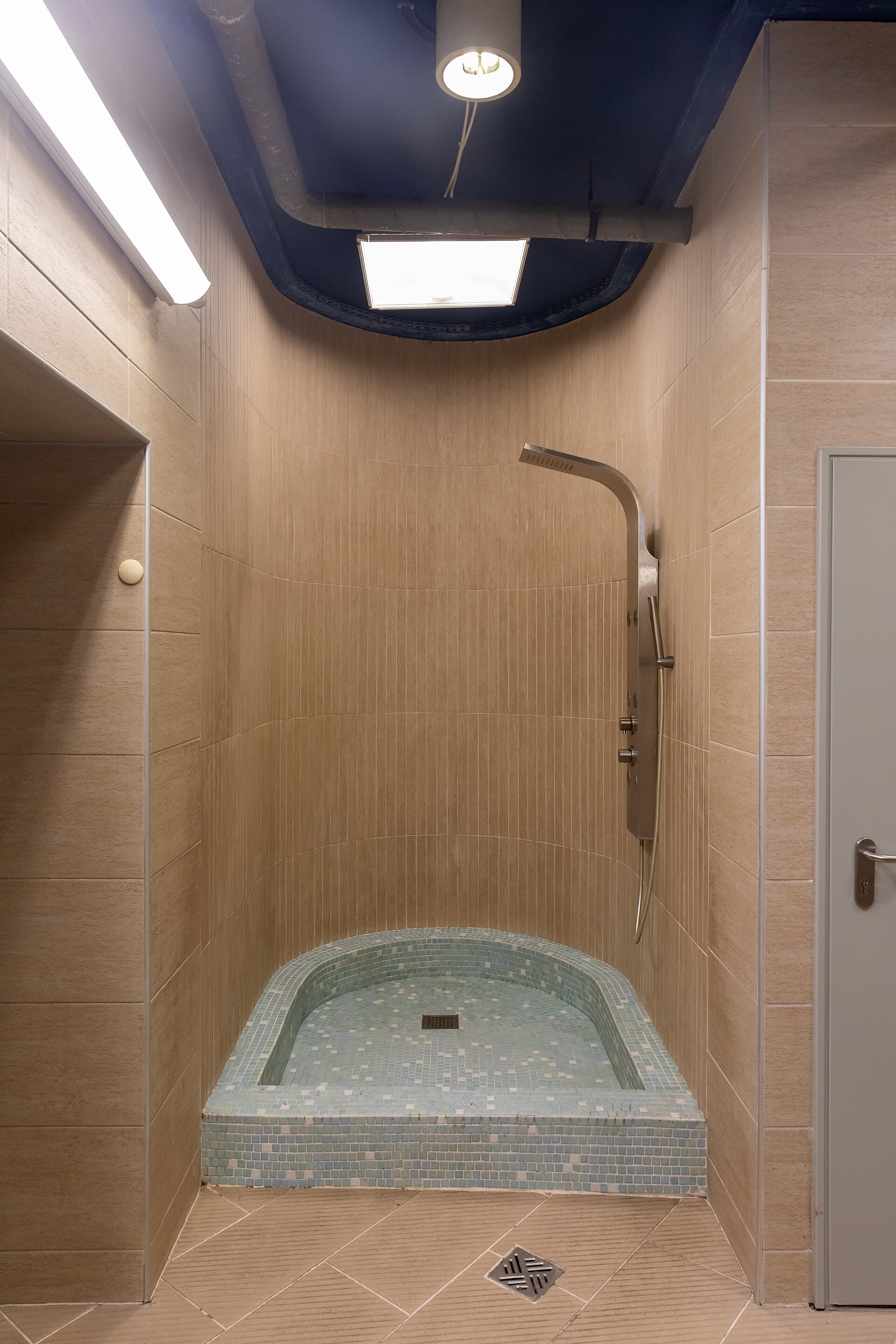 Shower inside the Silesian Stadium, Chorzów