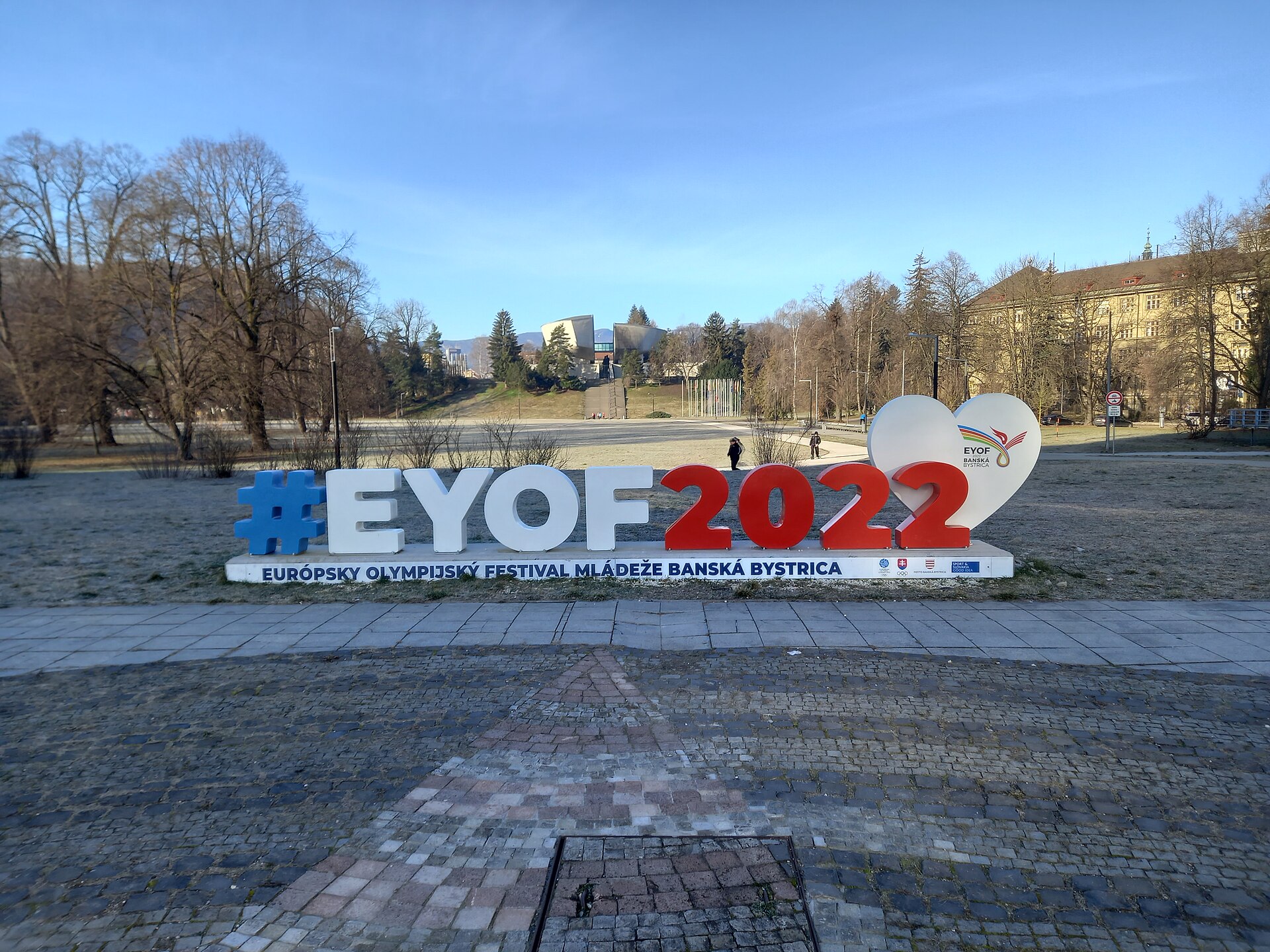 Logo of the 2022 European Youth Summer Olympic Festival on Námestie slobody (square) in Banská Bystrica