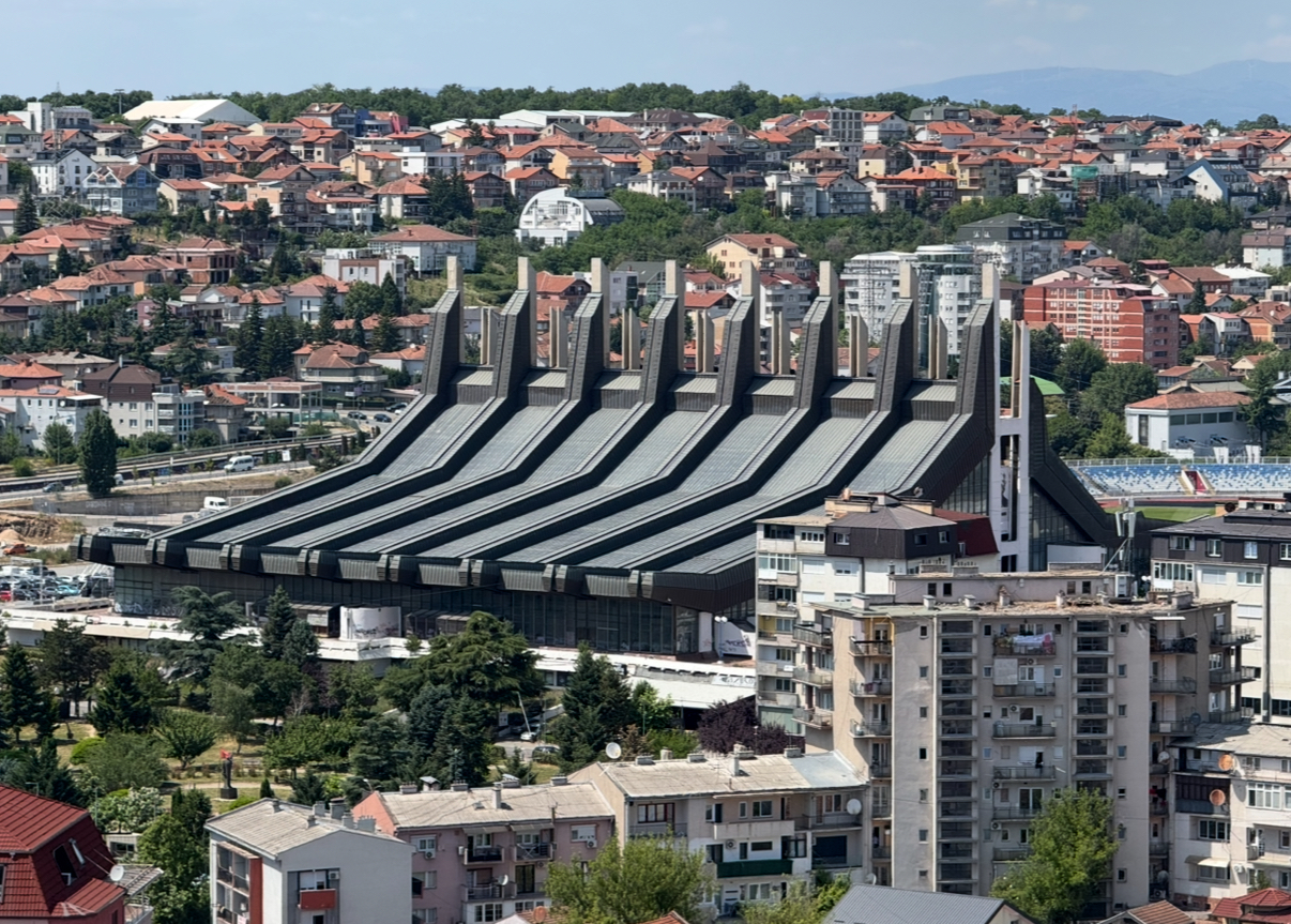 Pristina Palace of Youth and Sports as seen from the Cathedral of Saint Mother Teresa