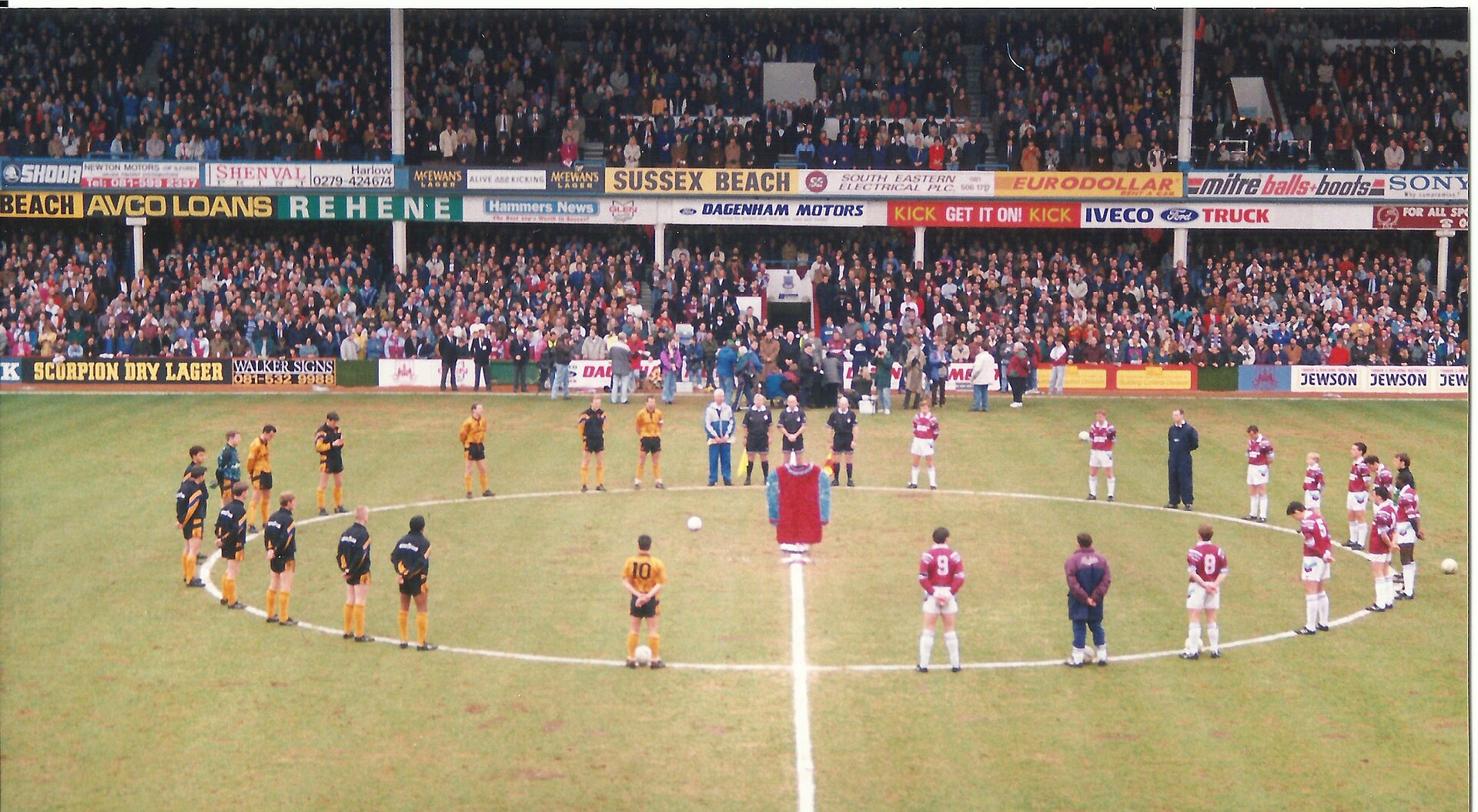 The players of West Ham and Wolves, line up for a minute's silence for Bobby Moore, before their game on 6 March 1993